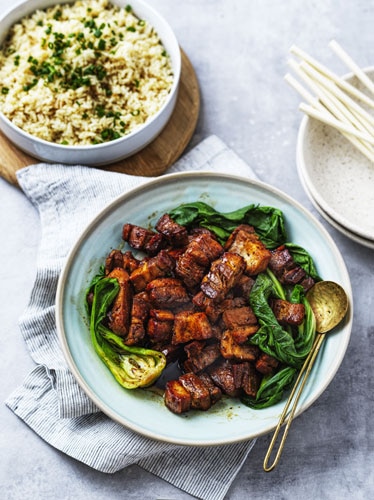 Sweet soy pork belly with greens and baked rice recipe